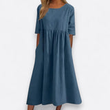 "Minea - Šaty z prodyšné bavlny" can be rewritten as "Minea - Lehké šaty z prodyšné bavlny".