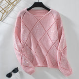 Ležérní pletený svetr s průstřihem