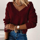 Volný pletený svetr" can be rewritten as "Oversized Knit Sweater.