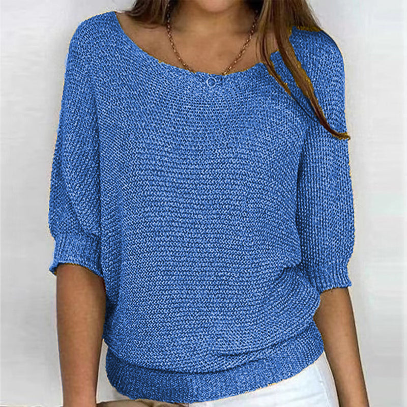 Jednoduchý volný svetr v jednobarevném provedení